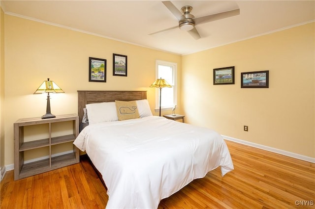 60 E Elizabeth St, Skaneateles, NY 13152 - bedroom with ornamental molding, wood finished floors, and a ceiling fan