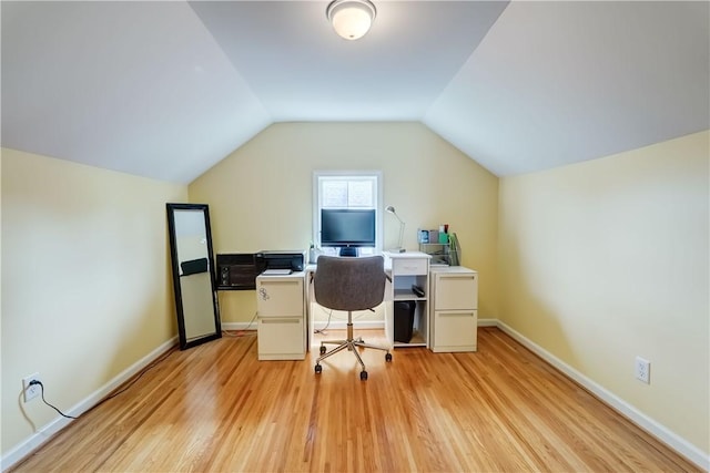 99 Hoover Rd, Irondequoit, NY 14617 - home office featuring light wood-style floors and vaulted ceiling