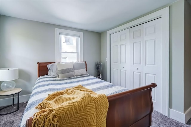 99 Hoover Rd, Irondequoit, NY 14617 - carpeted bedroom featuring a closet and baseboards