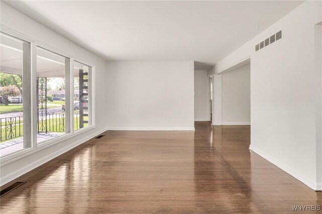 126 Pryor Ave, Tonawanda, NY 14150 - empty room with baseboards and wood finished floors