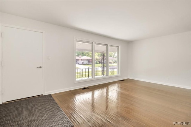126 Pryor Ave, Tonawanda, NY 14150 - spare room with wood finished floors and baseboards