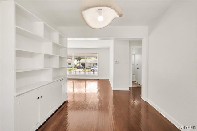 126 Pryor Ave, Tonawanda, NY 14150 - hallway featuring baseboards and dark wood-style flooring