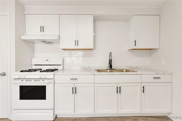 126 Pryor Ave, Tonawanda, NY 14150 - kitchen featuring white gas range, premium range hood, white cabinetry, and light countertops