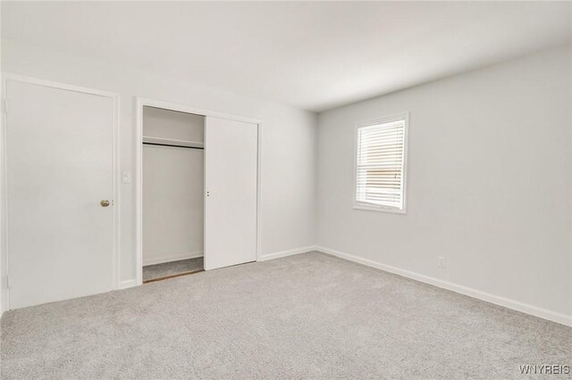 126 Pryor Ave, Tonawanda, NY 14150 - unfurnished bedroom featuring carpet flooring and a closet