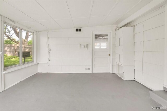 126 Pryor Ave, Tonawanda, NY 14150 - empty room featuring finished concrete floors and concrete block wall