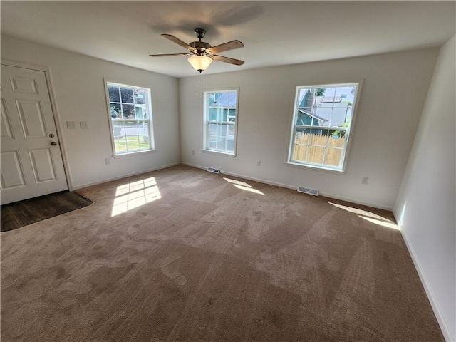 32 Jefferson St, North Dansville, NY 14437 - carpeted empty room featuring baseboards and a ceiling fan