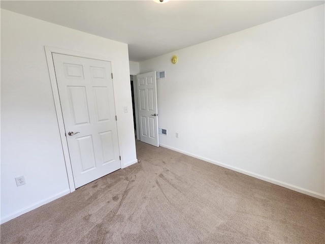 32 Jefferson St, North Dansville, NY 14437 - unfurnished bedroom with carpet floors and baseboards