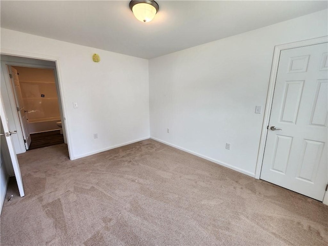 32 Jefferson St, North Dansville, NY 14437 - carpeted spare room with baseboards
