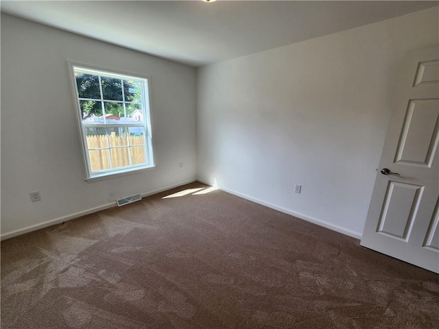 32 Jefferson St, North Dansville, NY 14437 - carpeted empty room featuring baseboards