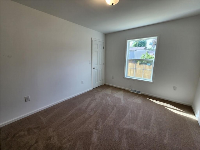 32 Jefferson St, North Dansville, NY 14437 - spare room with carpet and baseboards