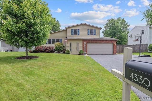 4330 Cinnamon Path, Clay, NY 13090 - view of front of property featuring a garage, brick siding, and driveway