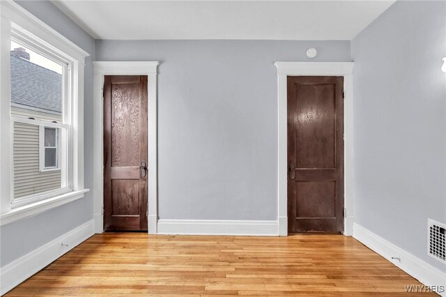 88 Rugby Rd, Buffalo, NY 14216 - spare room with light wood-style flooring and a smoke detector