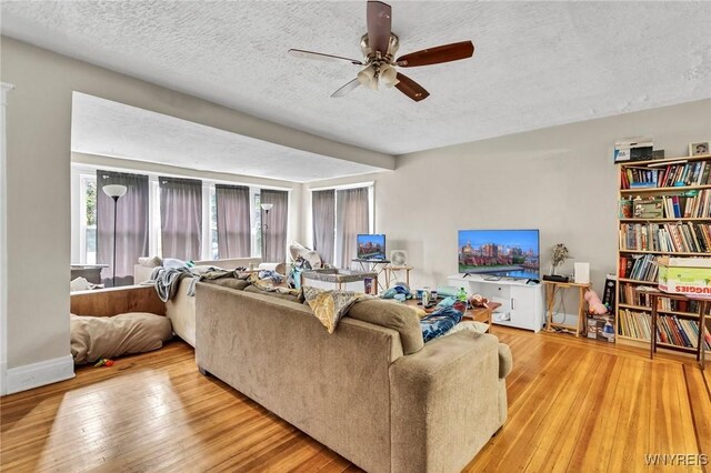 88 Rugby Rd, Buffalo, NY 14216 - living room with ceiling fan, a textured ceiling, and wood-type flooring