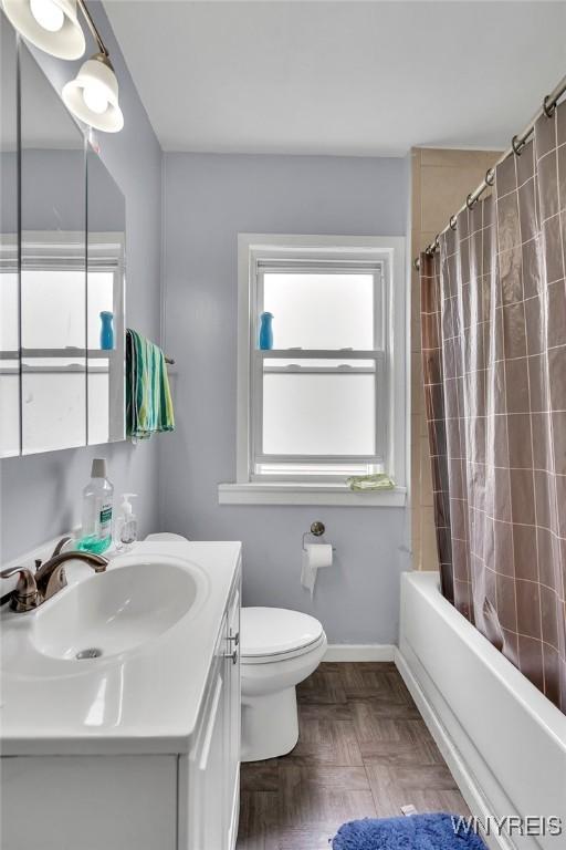 88 Rugby Rd, Buffalo, NY 14216 - bathroom featuring vanity and shower / bath combo with shower curtain