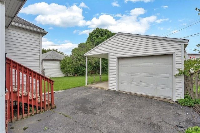 88 Rugby Rd, Buffalo, NY 14216 - detached garage featuring asphalt driveway