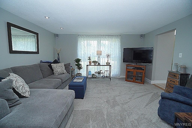 3190 Clearview Way, Hamburg, NY 14219 - carpeted living room featuring a textured ceiling and recessed lighting