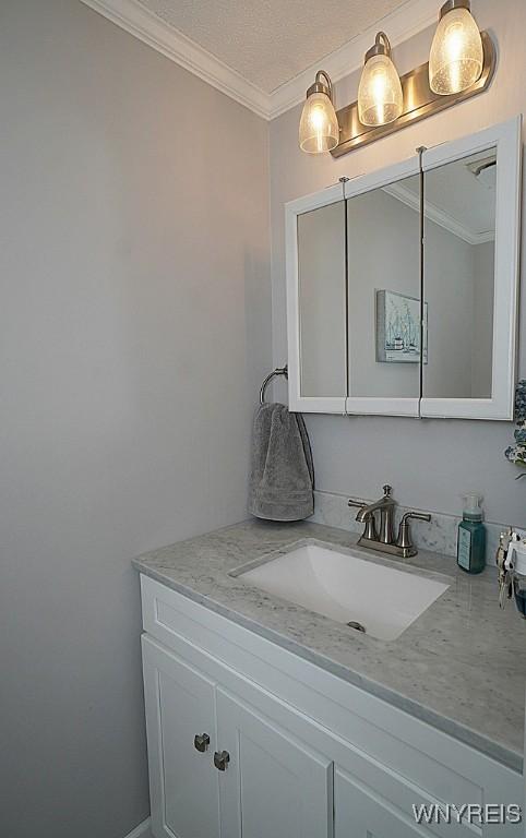 3190 Clearview Way, Hamburg, NY 14219 - bathroom featuring vanity and ornamental molding