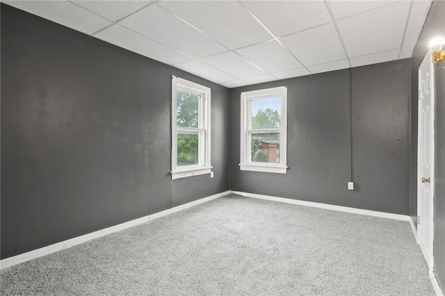 328 W Main St, Palmyra, NY 14522 - spare room with a paneled ceiling and carpet
