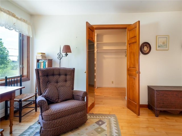 11037 Pratt Ln Unit 21, Yates, NY 14098 - sitting room featuring light wood-style flooring