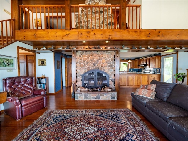 11037 Pratt Ln Unit 21, Yates, NY 14098 - living room with wood finished floors, plenty of natural light, and a stone fireplace