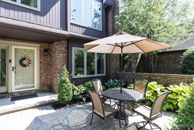 61 Hidden Ridge Cmn, Amherst, NY 14221 - view of patio with outdoor dining space