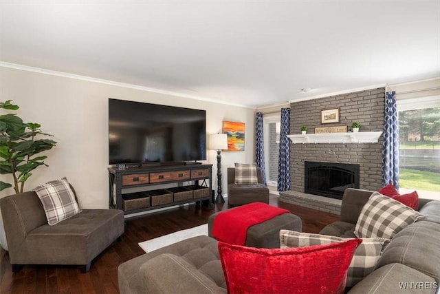 61 Hidden Ridge Cmn, Amherst, NY 14221 - living room featuring ornamental molding, wood finished floors, and a brick fireplace