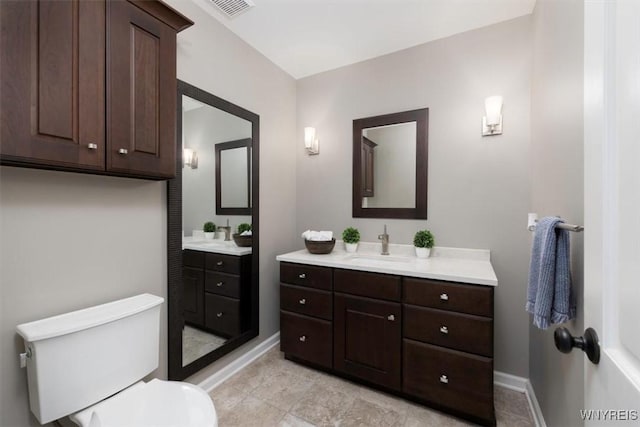 61 Hidden Ridge Cmn, Amherst, NY 14221 - bathroom with two vanities and tile patterned floors