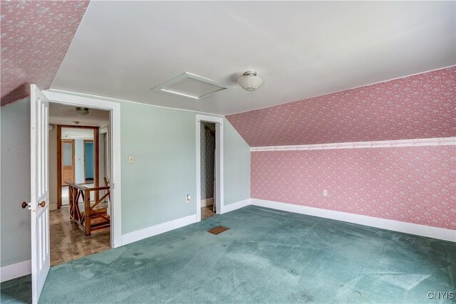 9569 Church St, Denmark, NY 13620 - bonus room featuring attic access, carpet flooring, wallpapered walls, and vaulted ceiling