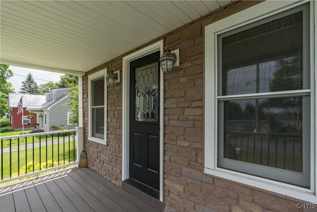 9569 Church St, Denmark, NY 13620 - porch with a lawn