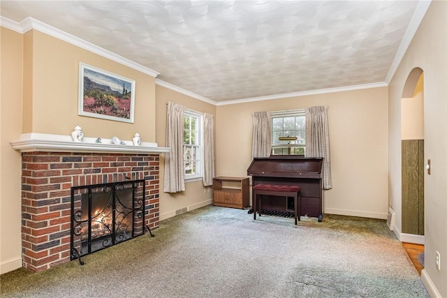 61 Avondale Rd, Irondequoit, NY 14622 - carpeted living room featuring a fireplace, arched walkways, and ornamental molding