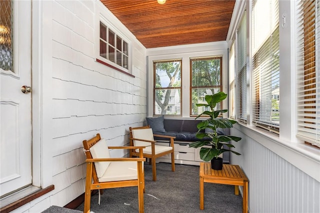 61 Avondale Rd, Irondequoit, NY 14622 - sunroom / solarium featuring wood ceiling, carpet flooring, and wooden walls