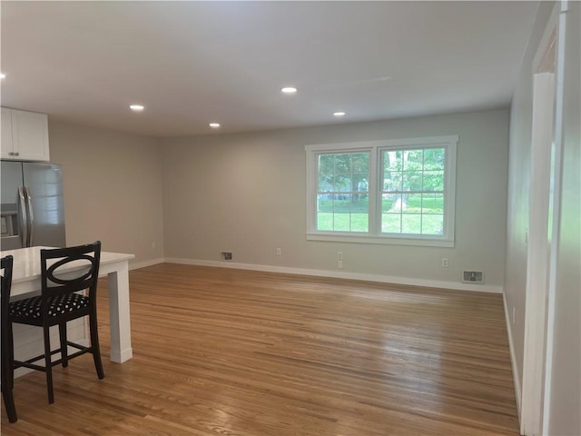 43 Harvest Rd, Perinton, NY 14450 - unfurnished dining area featuring light wood-type flooring and recessed lighting