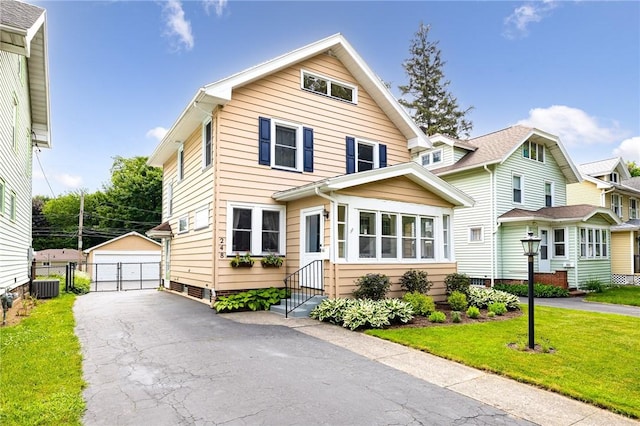 248 Marion St, Rochester, NY 14610 - view of front of home featuring entry steps, an outbuilding, and a garage