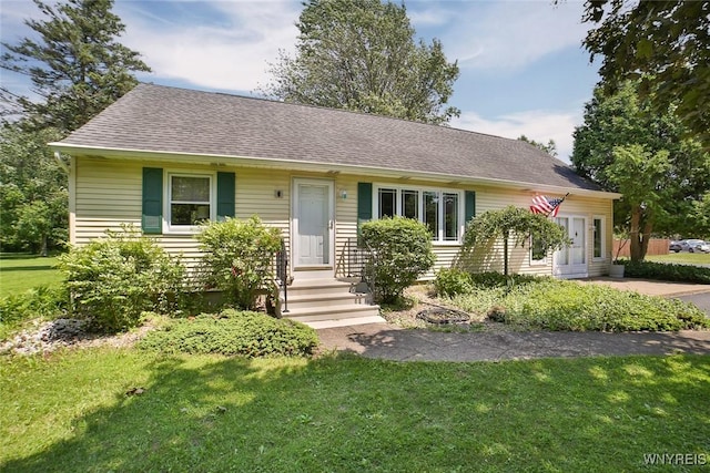 265 Miller Rd, Amherst, NY 14068 - view of front facade featuring a front yard and a shingled roof