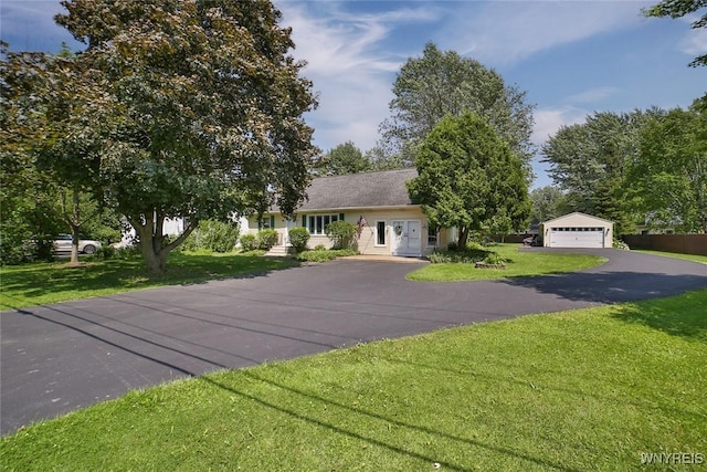 265 Miller Rd, Amherst, NY 14068 - view of front of house featuring a detached garage and a front lawn