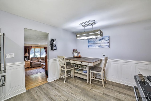265 Miller Rd, Amherst, NY 14068 - dining room with wood finished floors and wainscoting