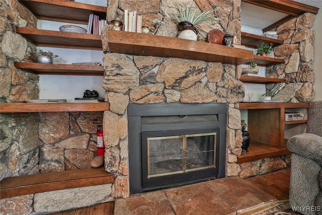 265 Miller Rd, Amherst, NY 14068 - detailed view of a glass covered fireplace and wood finished floors