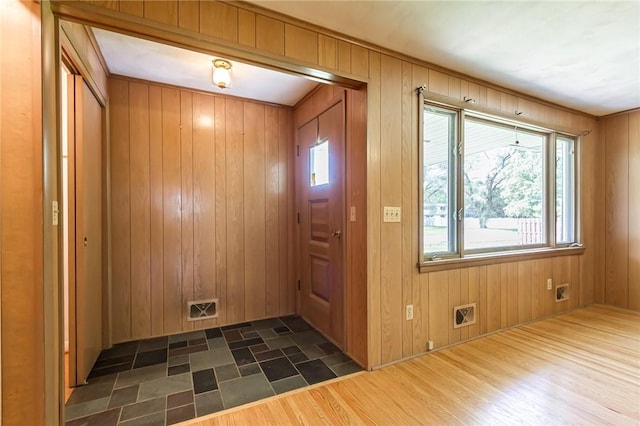 65 Meyerhill Cir E, Irondequoit, NY 14617 - entryway with wooden walls and dark wood-style floors