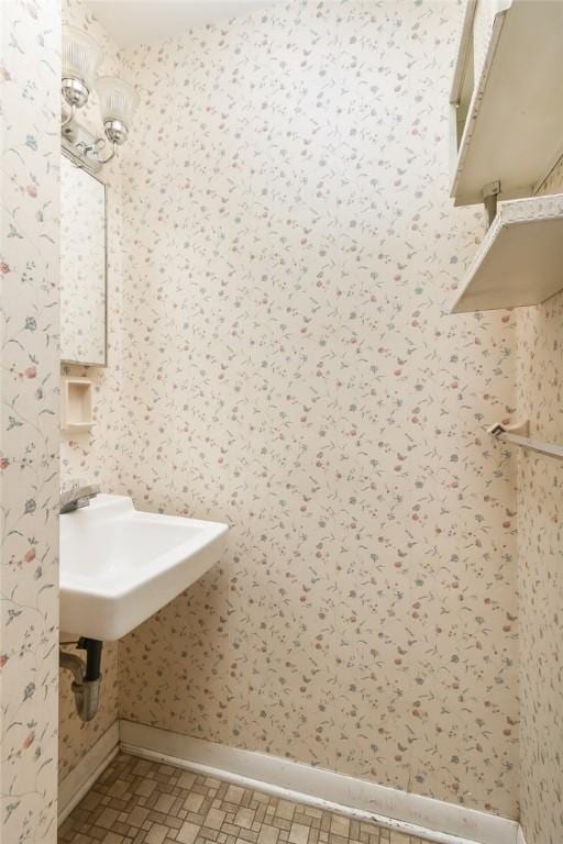 65 Meyerhill Cir E, Irondequoit, NY 14617 - bathroom with wallpapered walls and baseboards