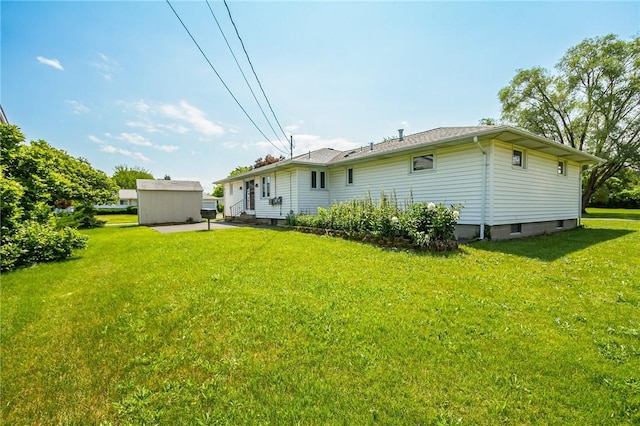 65 Meyerhill Cir E, Irondequoit, NY 14617 - rear view of property with a yard