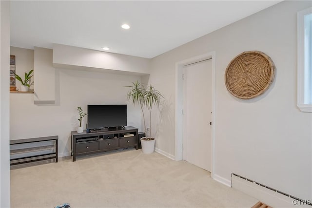 2304 Euclid Ave, Syracuse, NY 13224 - living area with a baseboard radiator, carpet, and recessed lighting