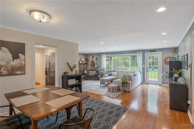 2304 Euclid Ave, Syracuse, NY 13224 - living room with light wood-style floors and recessed lighting