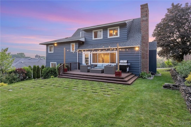 2304 Euclid Ave, Syracuse, NY 13224 - back of property at dusk featuring outdoor lounge area, a wooden deck, a chimney, and a yard