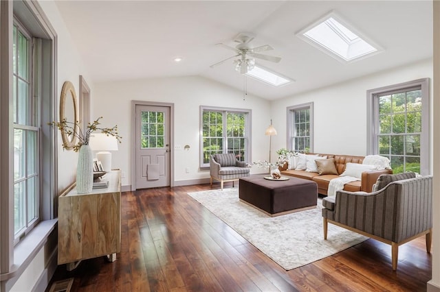 4 Park Pl E, Bloomfield, NY 14469 - living area featuring a skylight, ceiling fan, dark wood finished floors, and vaulted ceiling