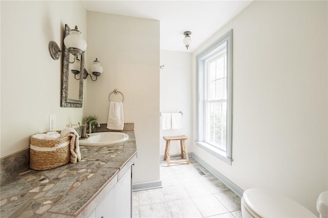 4 Park Pl E, Bloomfield, NY 14469 - bathroom featuring healthy amount of natural light and vanity