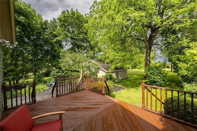 4 Park Pl E, Bloomfield, NY 14469 - deck featuring a lawn and view of wooded area