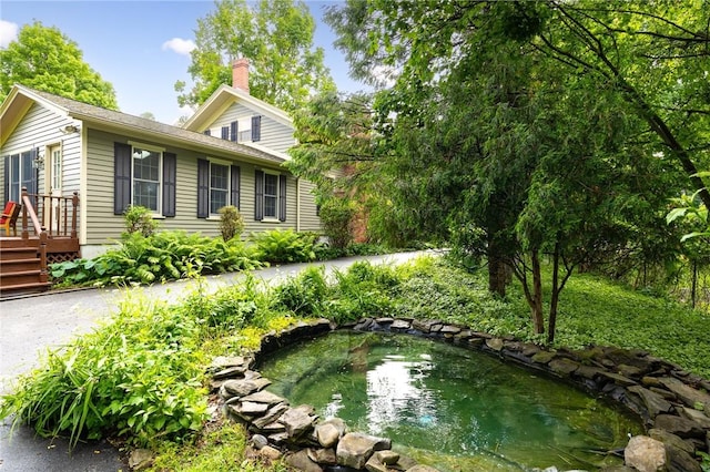 4 Park Pl E, Bloomfield, NY 14469 - view of yard with a garden pond