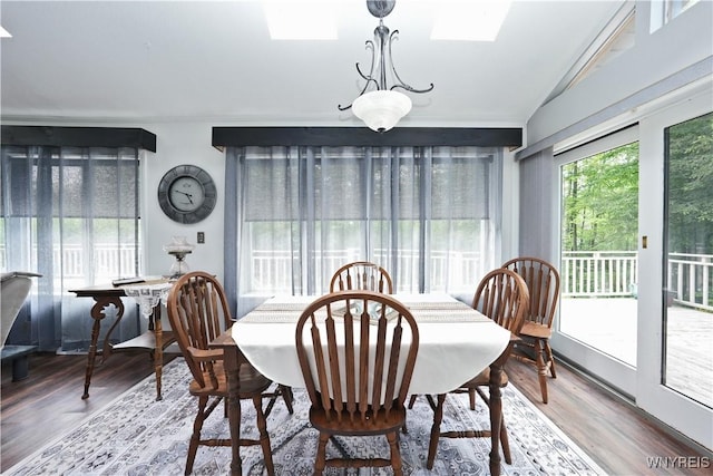 12261 Transit Line Rd, Concord, NY 14141 - dining room featuring vaulted ceiling, wood finished floors, and a skylight