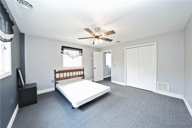 12261 Transit Line Rd, Concord, NY 14141 - bedroom featuring dark carpet, a closet, and a ceiling fan