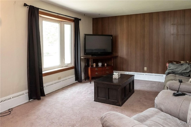 7210 Rickmeyer Rd, Floyd, NY 13440 - living room with a baseboard radiator, plenty of natural light, wooden walls, and light carpet